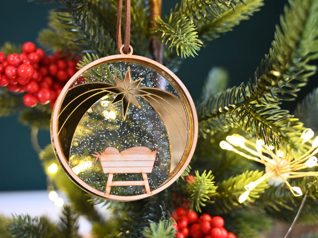 Manger golden star christmas ornament