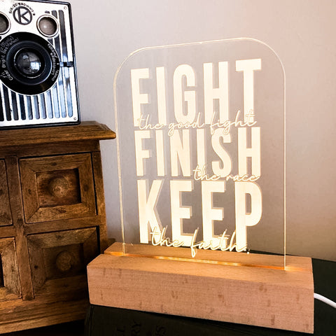 Fight the good fight 2 Timothy 4:7 light design - Birch and Tides