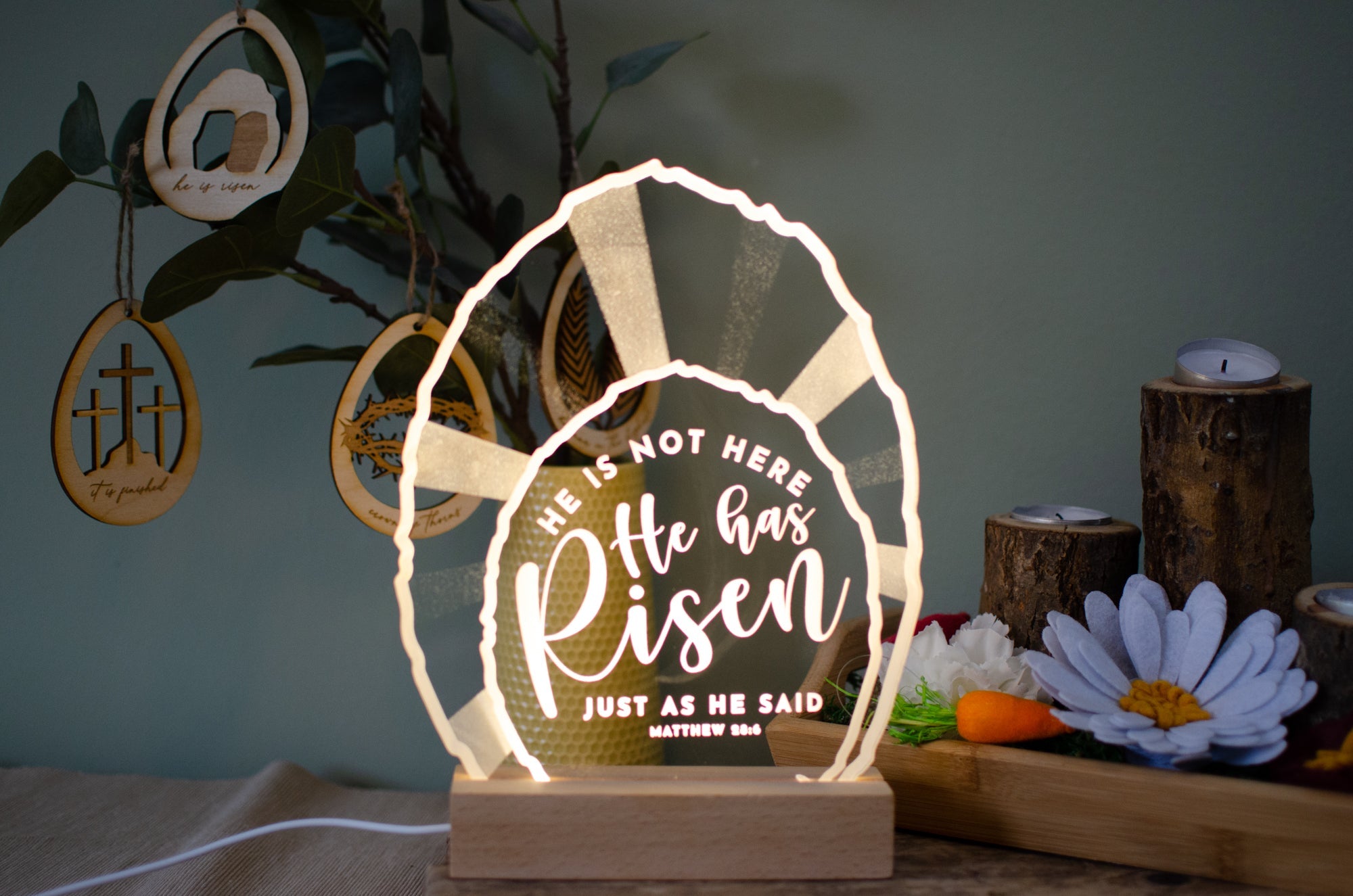 He has risen tomb light design