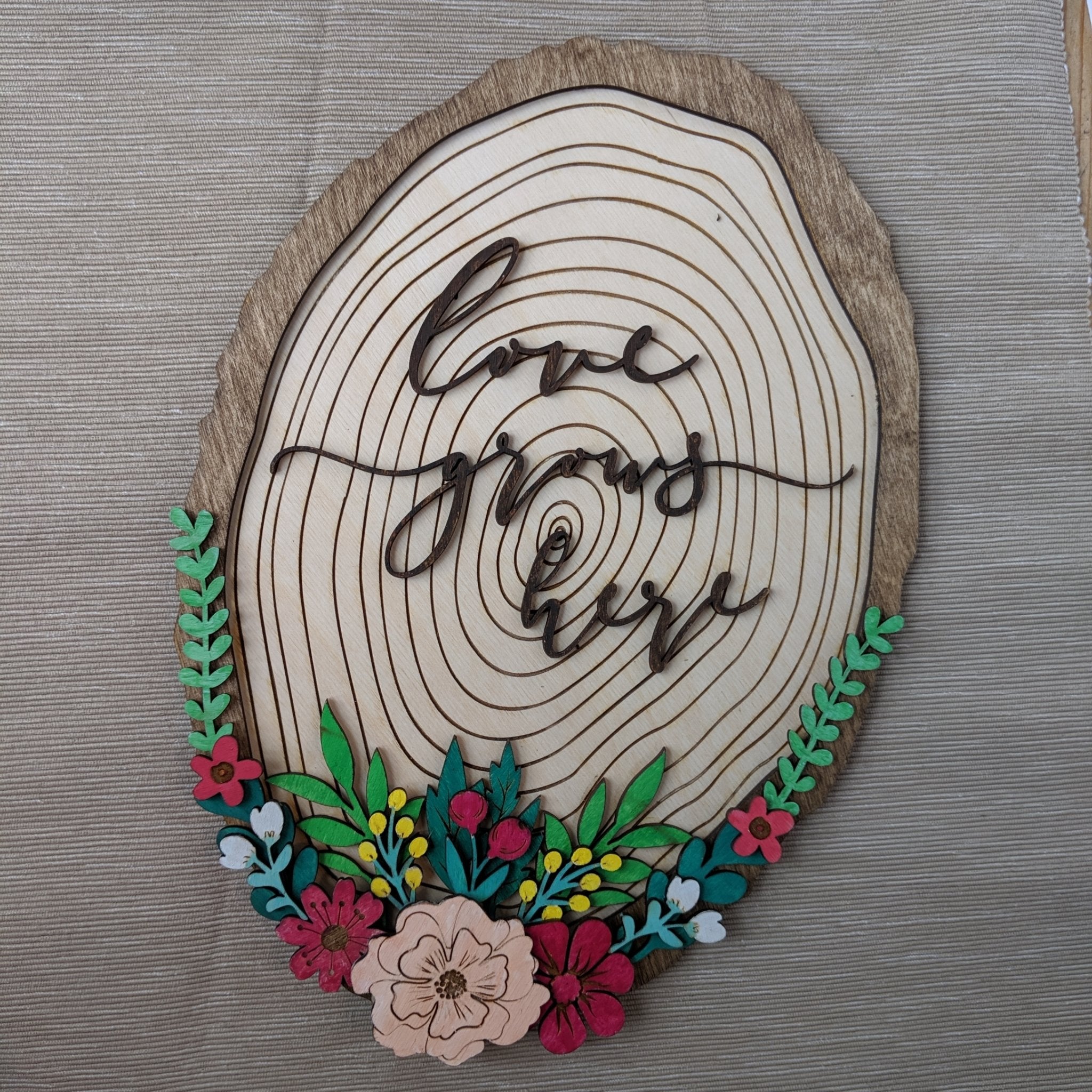 Love grows here wooden sign