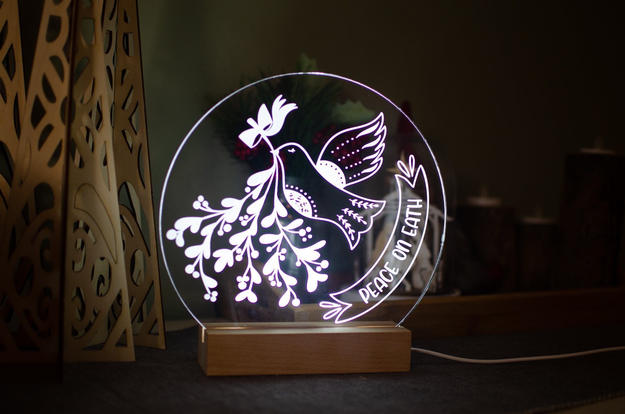 Peace on Earth engraved light design
