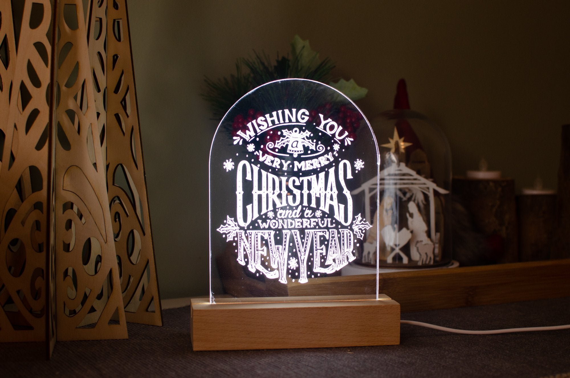 Wishing you a merry christmas engraved light design